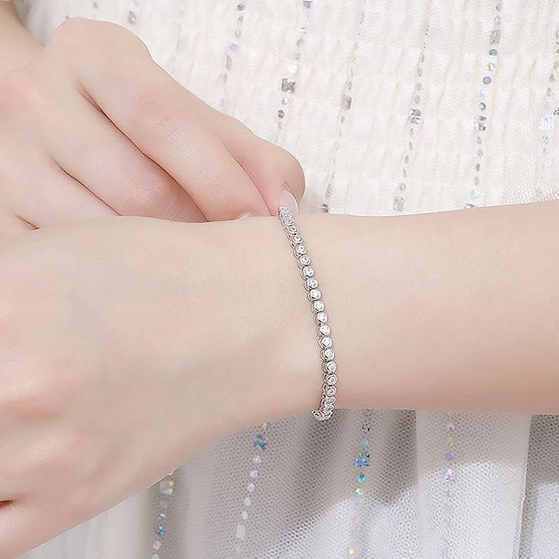 Iced Out Sterling Silver Round Bezel 2MM Moissanite Tennis Bracelet - Image 4