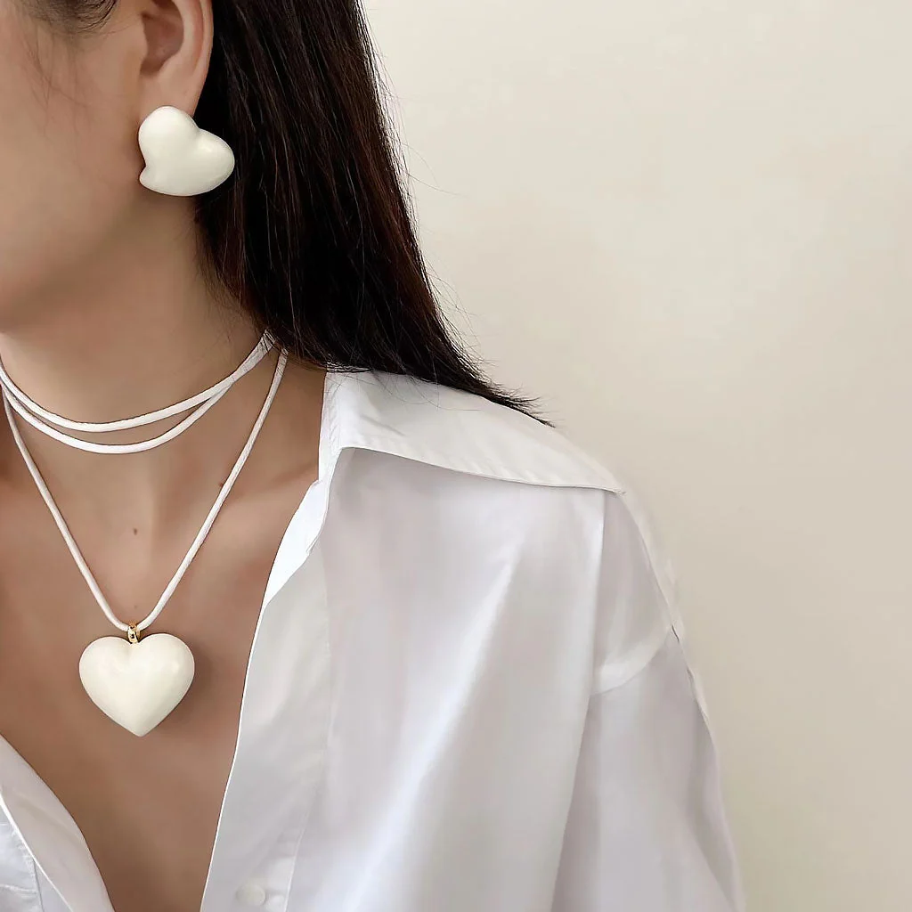 LOVE IS AROUND Two Tone Enameled Puffed Heart Pendant Wrapped Cord NeckLace - Image 3