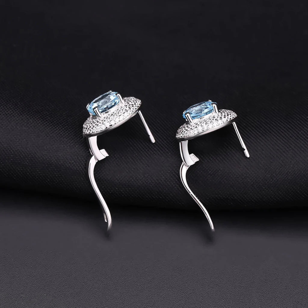 Opulent Blue Topaz Halo Clear Cubic Zirconia Cluster Stud Earrings - Image 4