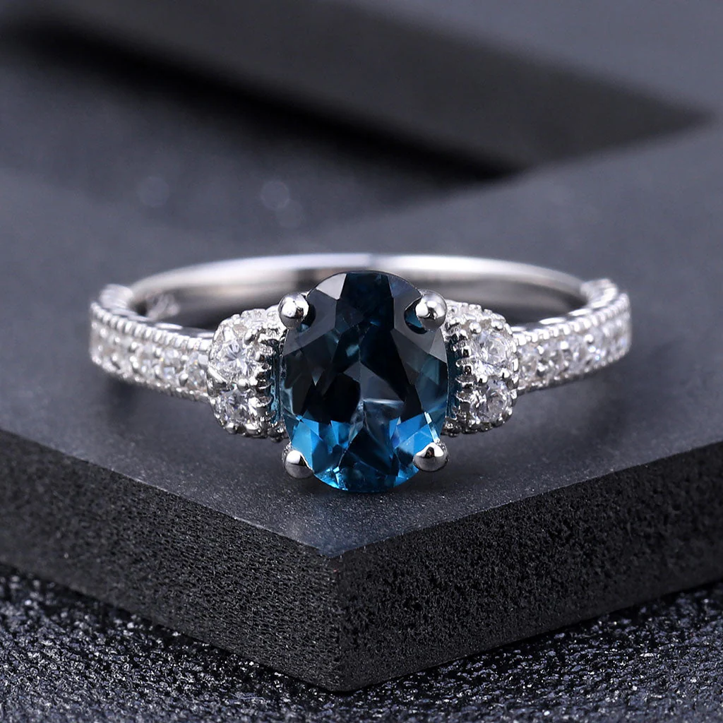 Opulent Clear Cubic Zirconia London Blue Topaz Halo Ring - Image 2